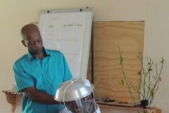 Farmers Receive an Integrated Pest Management Lesson From Ministry of Agriculture