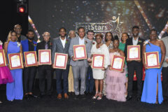 FirstStars Awards winners with senior executives of CIBC FirstCaribbean, at right is CEO Mark St. Hill