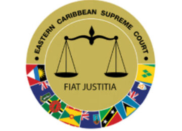 Circular logo for the Eastern Caribbean Supreme Court with a scale in the middle and surrounded by flags of the eastern caribbean countries