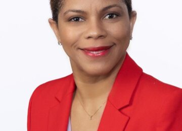 Head shit of a woman, Dr. Camille Lewis.